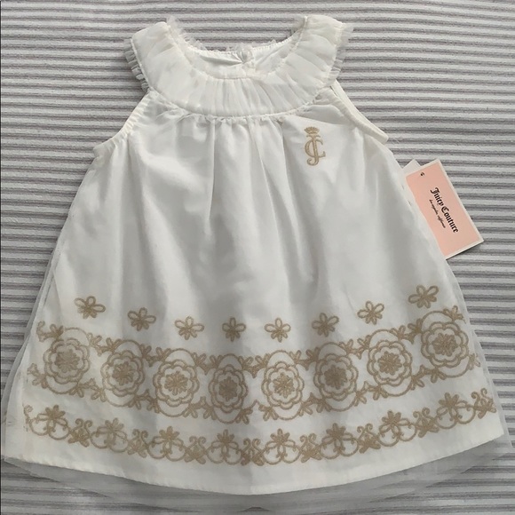 white dress with gold trim